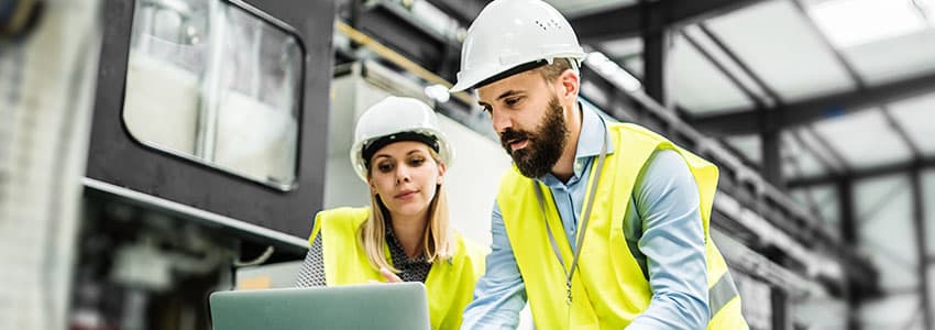 Woman and man industrial setting